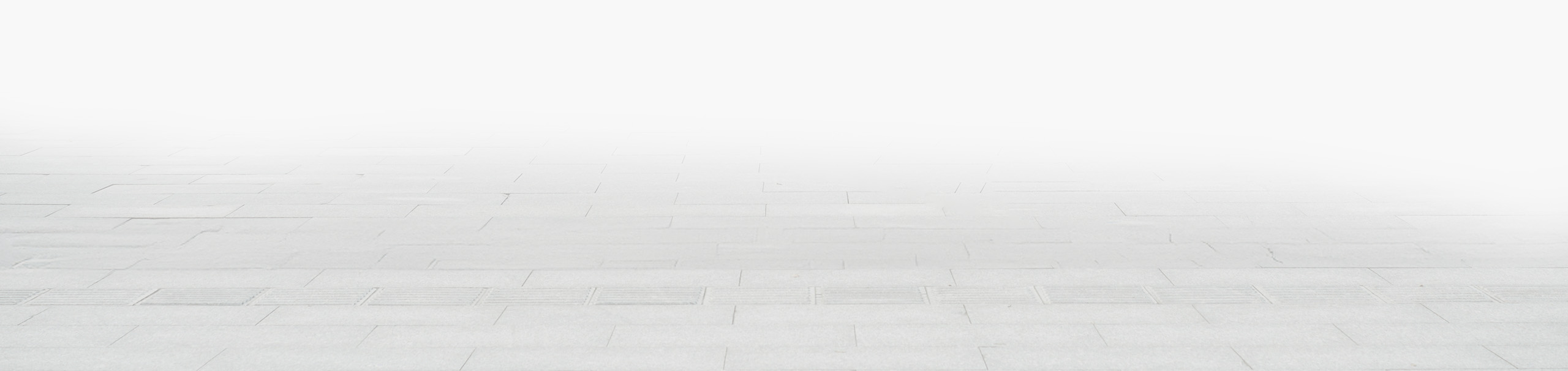 Zdjęcie przedstawia jasne tło z płytkami na podłodze, które może być używane jako podkład do prezentacji produktów lub innych elementów graficznych.