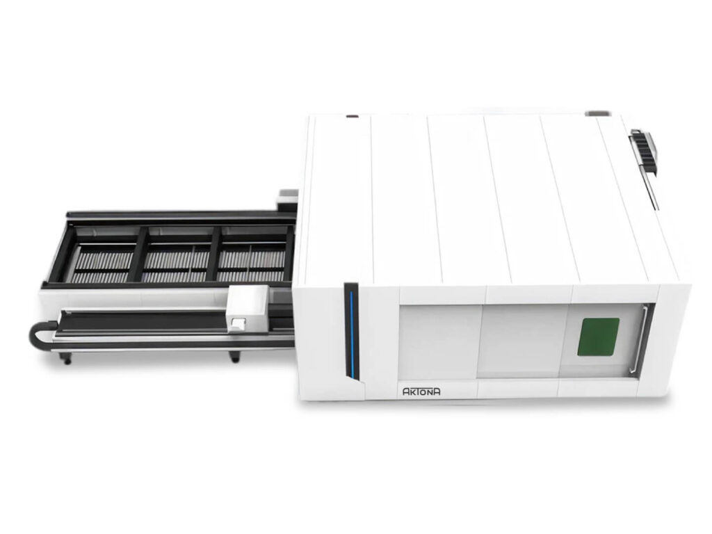 Wycinarka laserowa TR6020-RA, widok z góry. Biała obudowa z wysuwanym stołem roboczym.